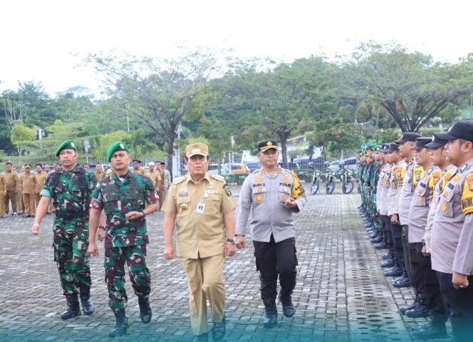 
Bupati Sukiman Pimpin Apel 3 Pilar Pengamanan Pemilu 2024